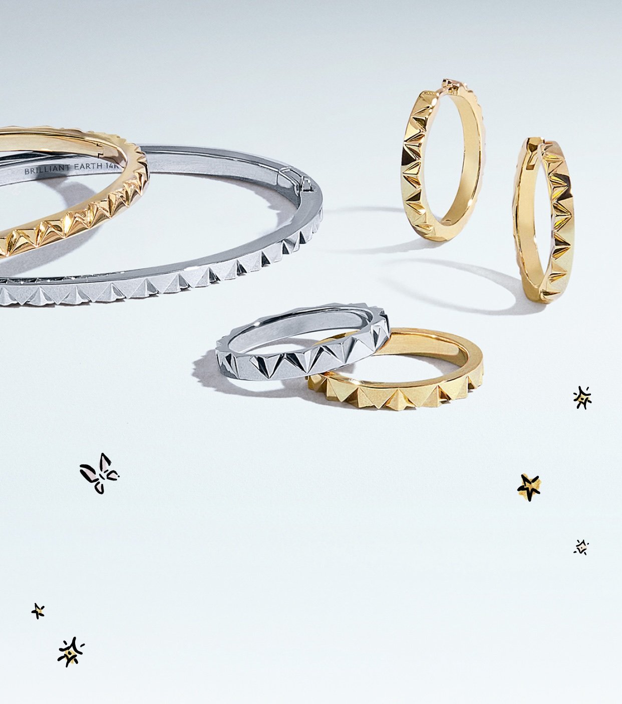 Model wearing an assortment of yellow gold and white gold jewelry from the Sol Collection.